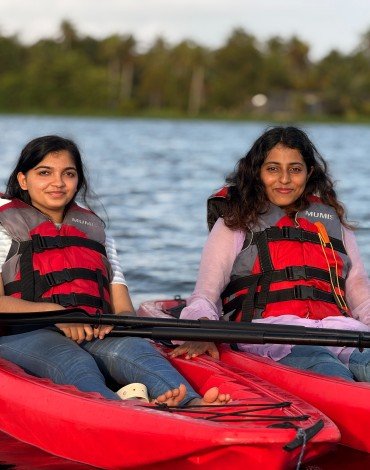 Village kayaking trip in Alappuzha backwaters at sunrise
